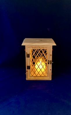 These wood lanterns are hand crafted with a variety for wood species. Lanterns can be ordered by selected type of wood, size, and panel design. To be used indoors.